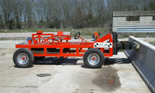 four-wheeled vehicle with red steel structure