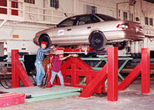 researchers working on car raised 6 feet